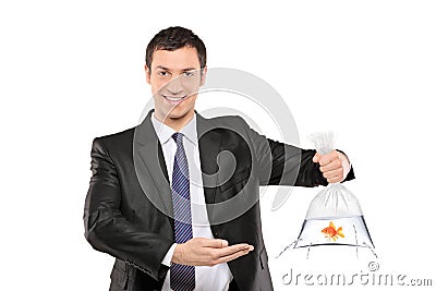 smiling-man-holding-a-plastic-bag-with-fish-thumb17581681.jpg